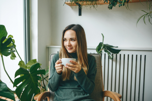 woman having a cup of coffee 