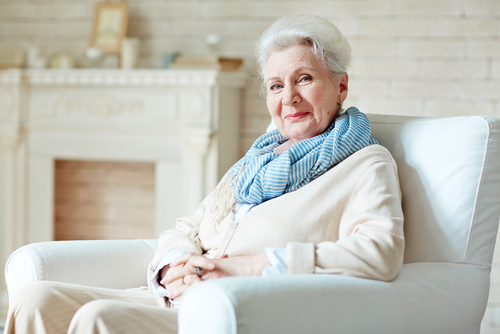 woman sitting on chair 